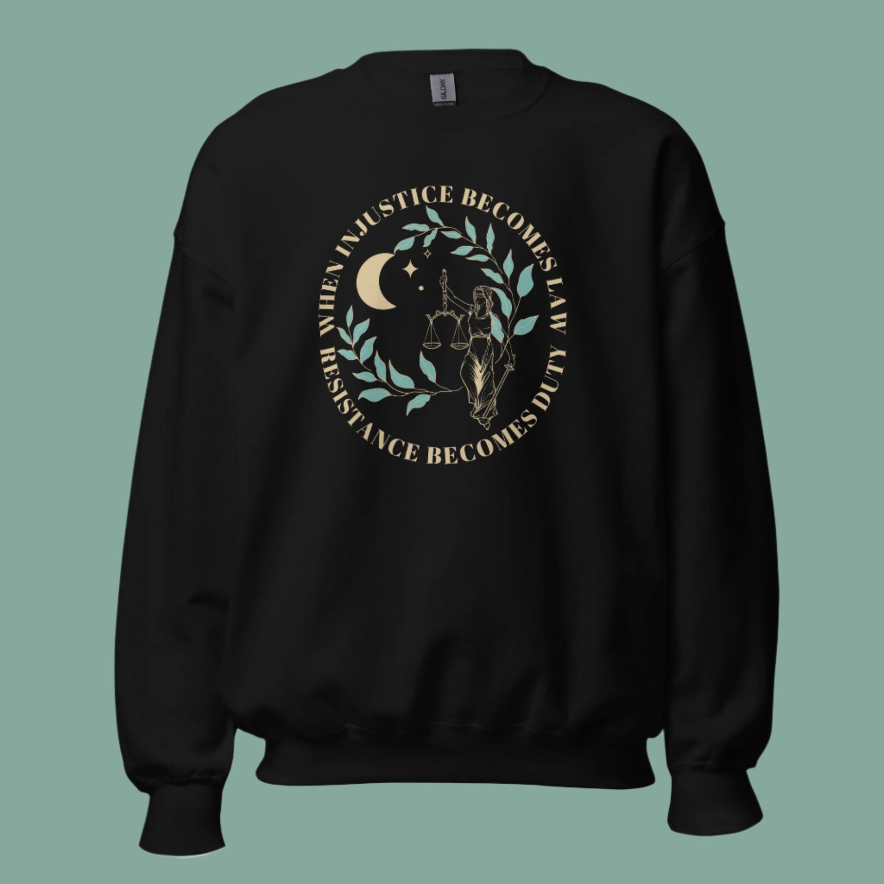 Mockup of a black sweatshirt with the phrase, "When injustice becomes law, resistance becomes duty."