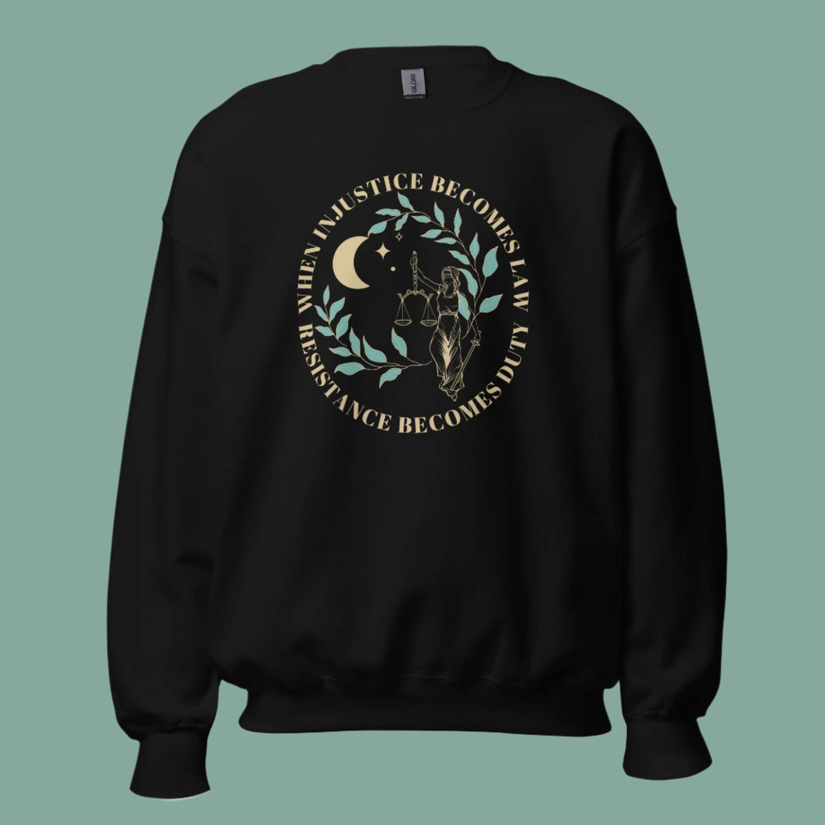 Mockup of a black sweatshirt with the phrase, "When injustice becomes law, resistance becomes duty."