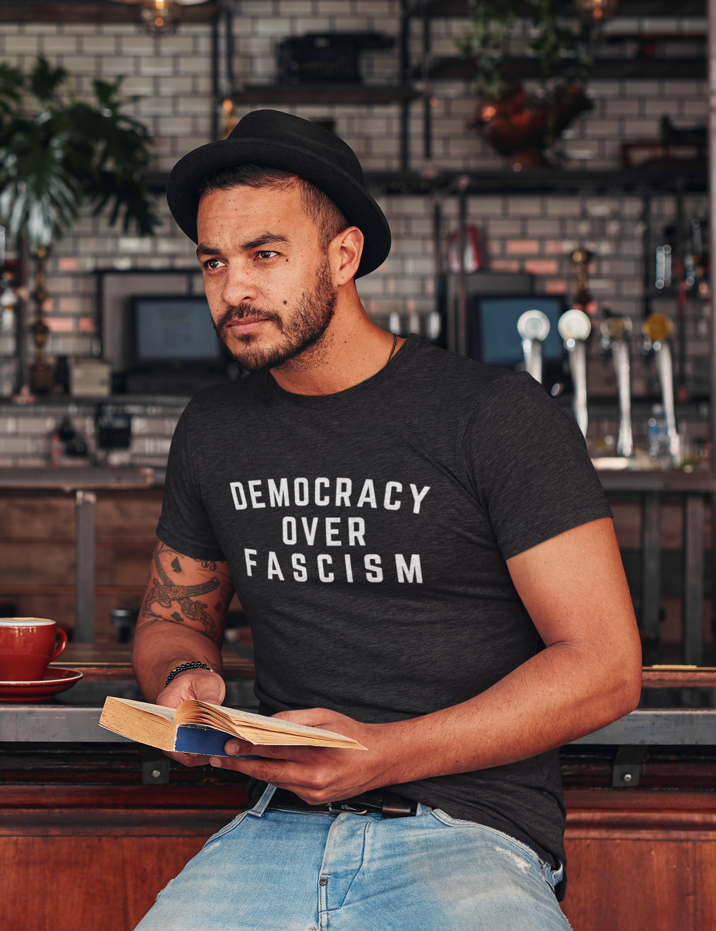 heather-t-shirt-mockup-of-a-man-reading-at-a-pub-34986-r-el2.png