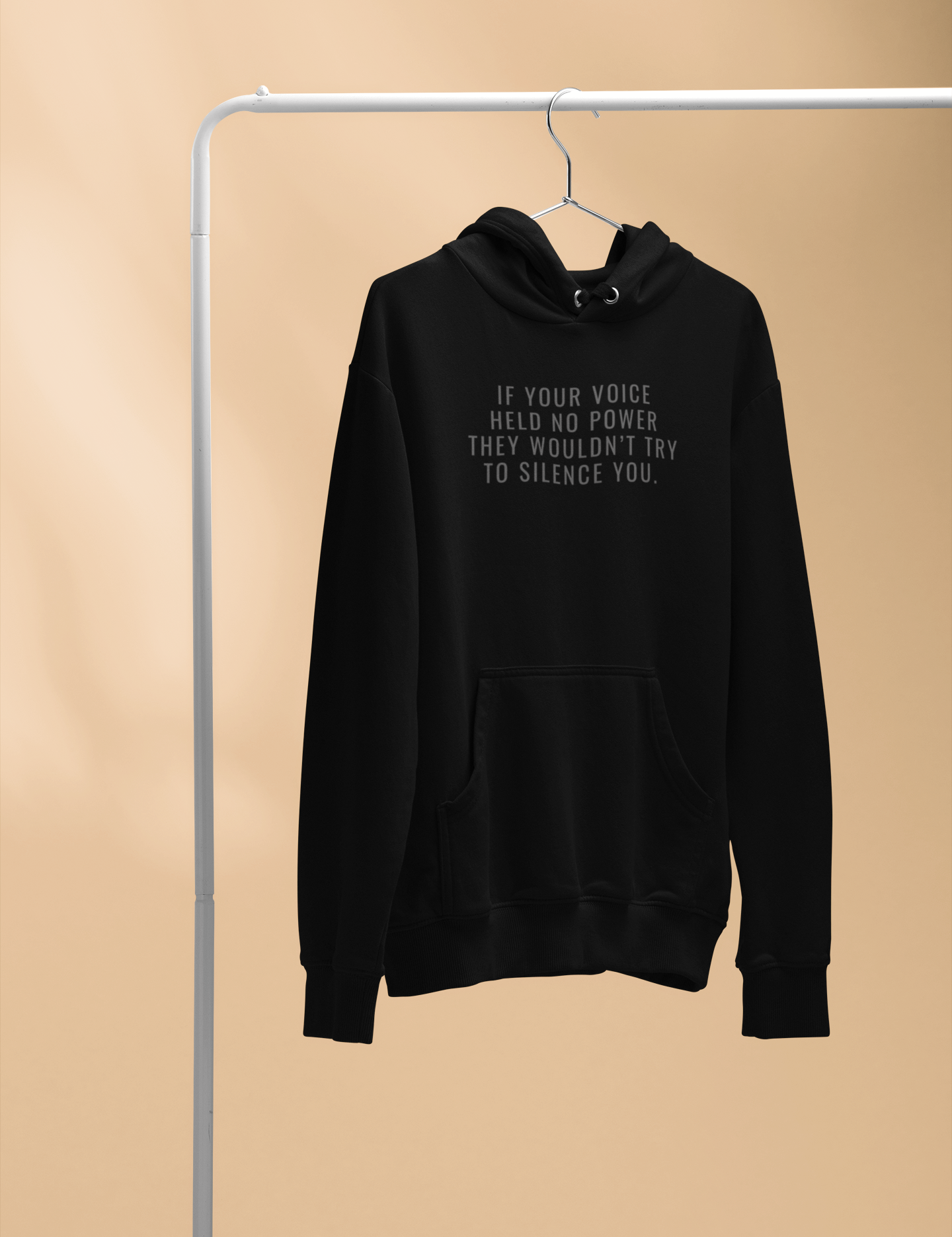 mockup-of-a-pullover-hoodie-hanging-from-a-pipe-27497.png