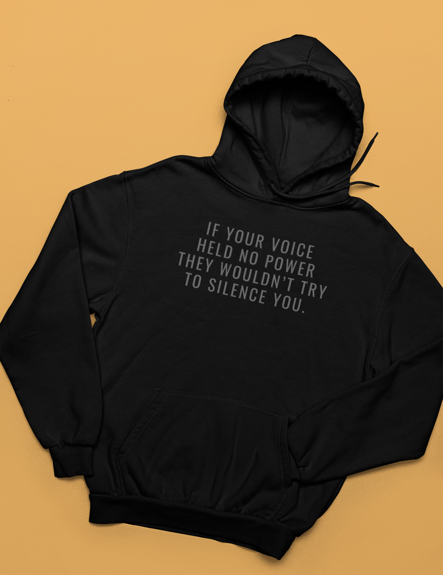 mockup-of-a-pullover-hoodie-placed-on-a-customizable-surface-33899.png