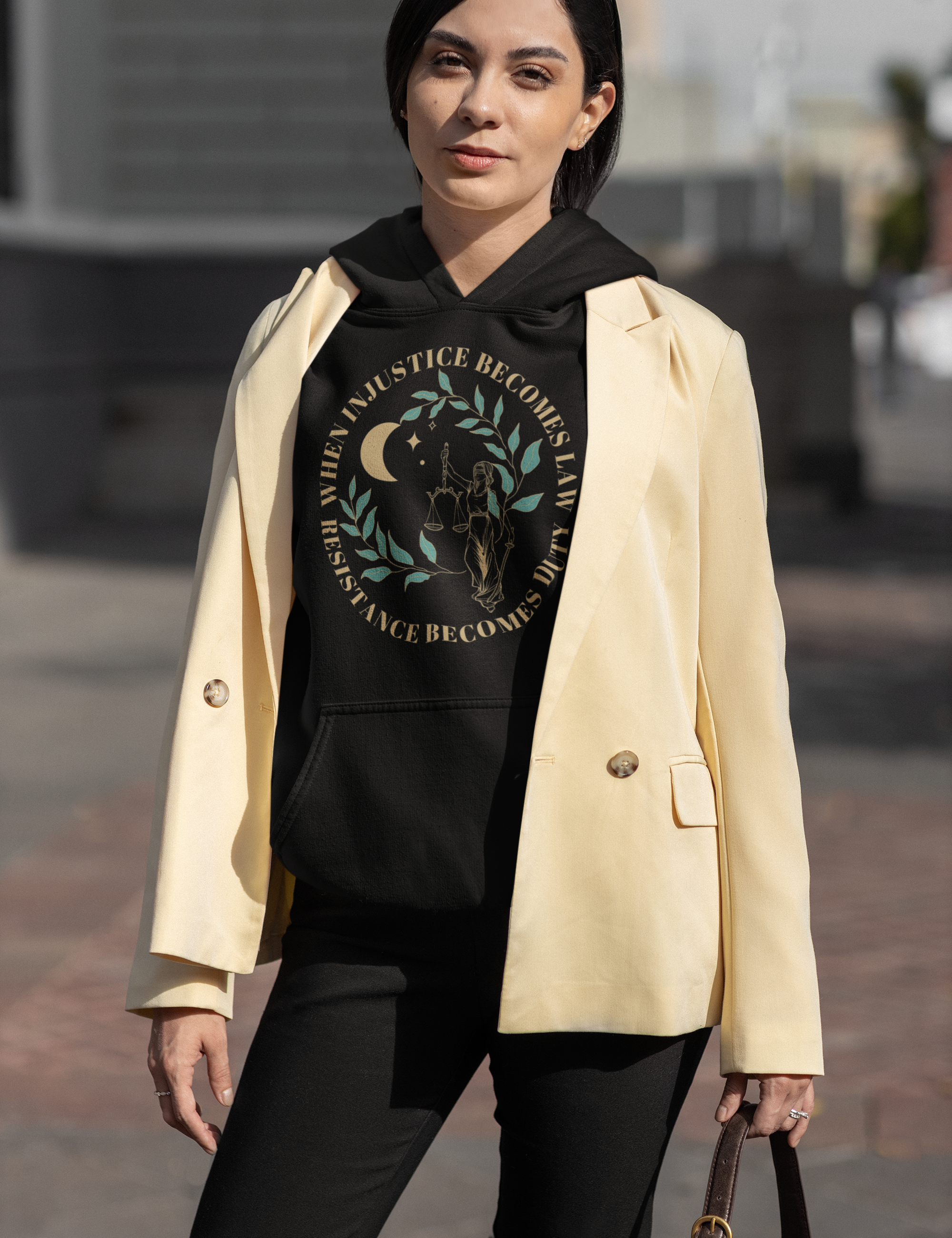 modest-fashion-inspired-mockup-of-a-woman-wearing-a-pullover-hoodie-under-a-blazer-m37991.png