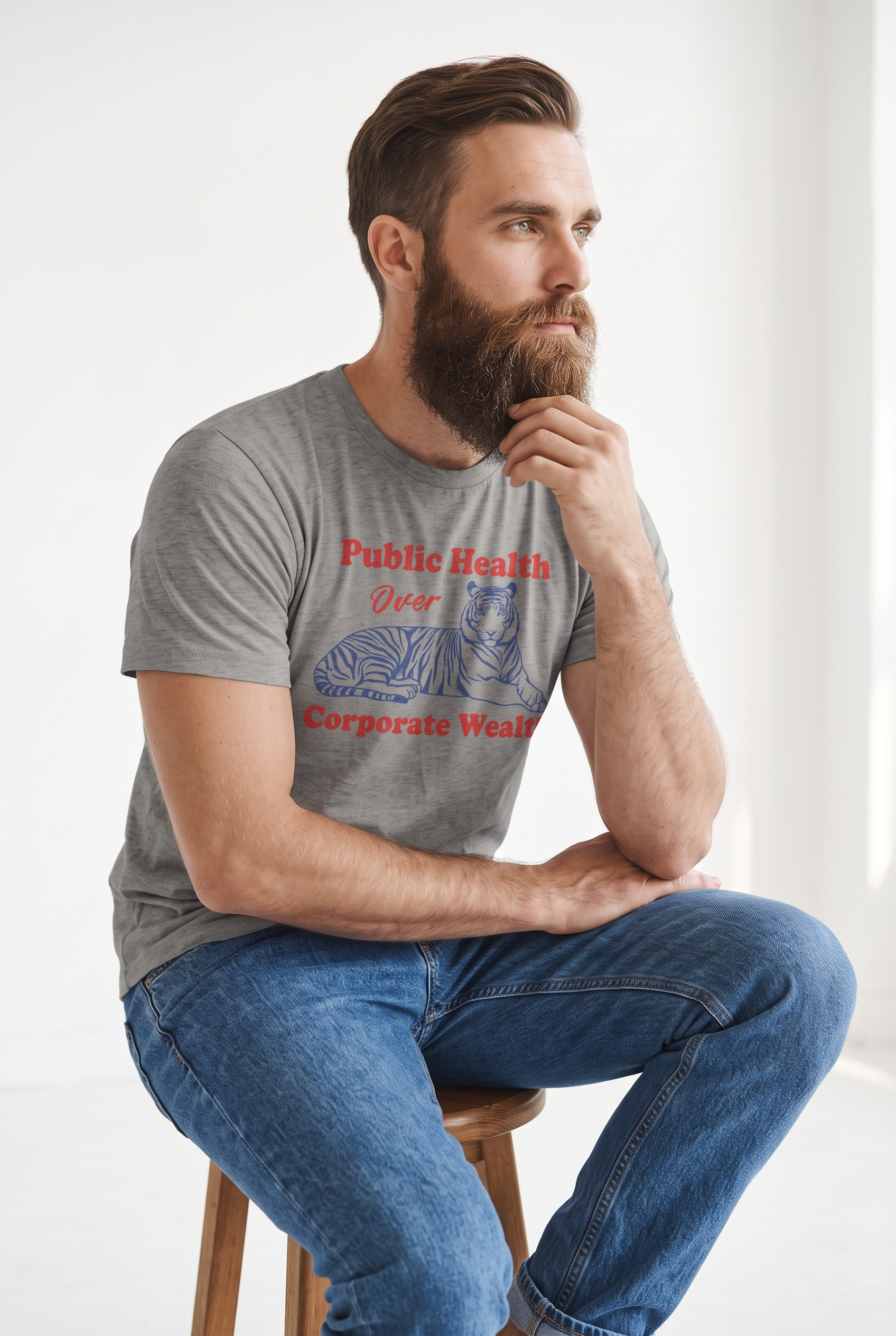Public Health Over Corporate Wealth Triblend T-shirt
