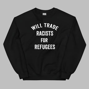 Flat lay of a black sweatshirt on a neutral background. The sweatshirt features bold white text across the chest that reads: “Will Trade Racists for Refugees.”